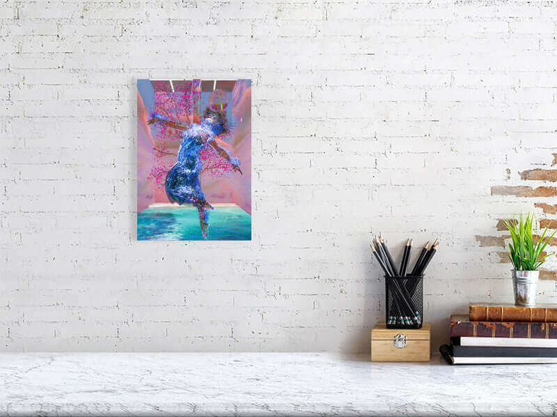 Trippy digital art print framed on white brick wall, featuring a modern abstract figure with vibrant colors, on a stylish desk.