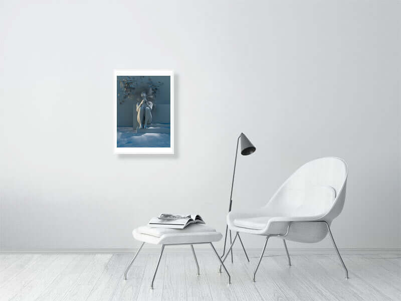 Framed digital art print "Free as a Bird" by Clay Mode on a modern wall, styled with a white chair and contemporary decor