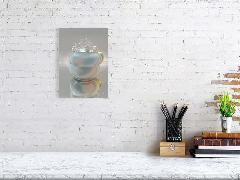 Trippy digital art print on framed canvas in modern workspace with white brick wall, showcasing smooth texture and precise color detail.