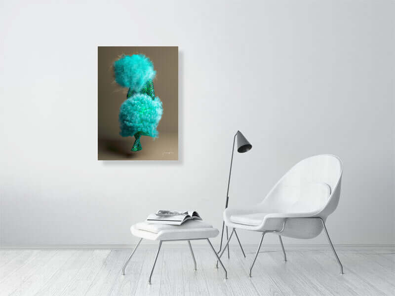 Framed modern digital art print on canvas titled "Puff" by artist, featuring trippy, teal cotton-like trees in a minimalist room setting.