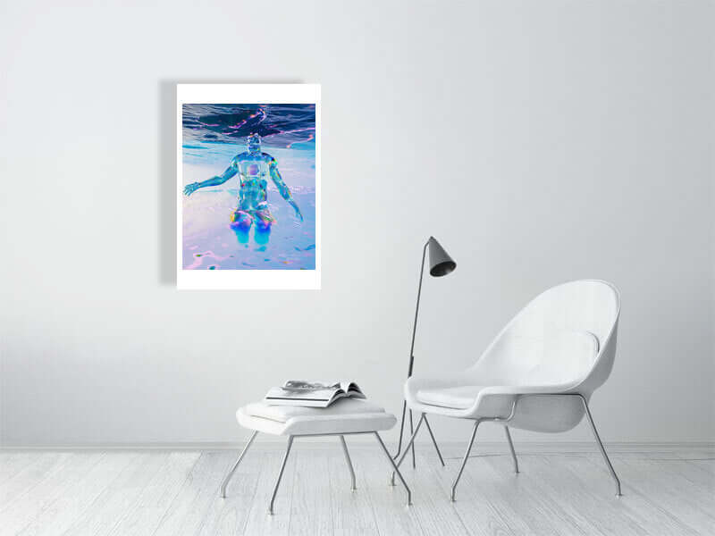 Modern trippy digital art print on framed canvas, displayed in minimalist room with white chair and lamp.