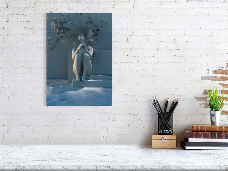 Digital art print "Free as a Bird" on a white brick wall with desk, pencils, and books in the foreground