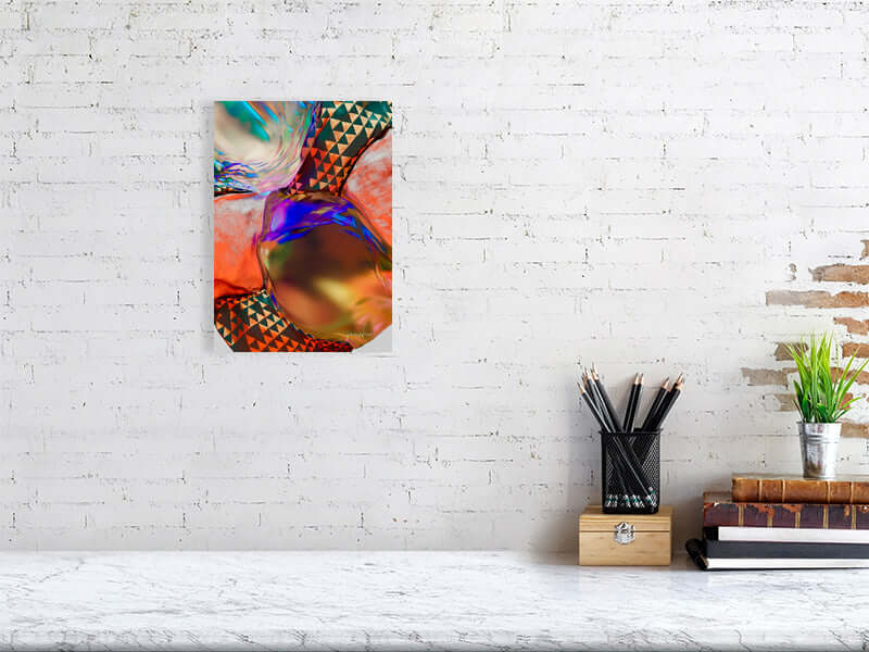 Modern digital art print titled "Stressed" with trippy abstract design, displayed on a white wall above a minimalist desk.