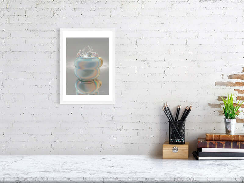 Digital art print of trippy cup on Hahnemühle Photorag paper, framed on modern white brick wall, showcasing smooth and luxurious finish